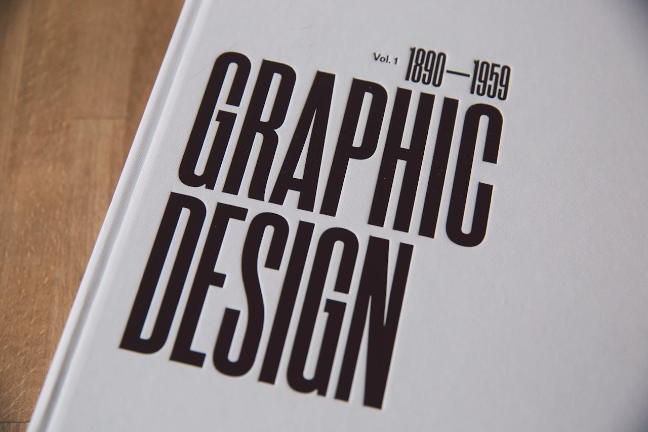 Close-up image of a graphic design book cover with bold text.